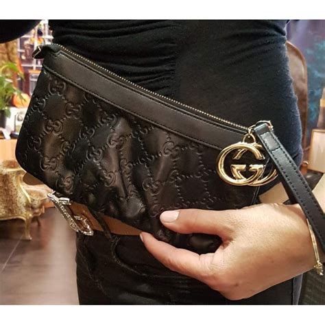 pochette da polso gucci|gocce Gucci donna.